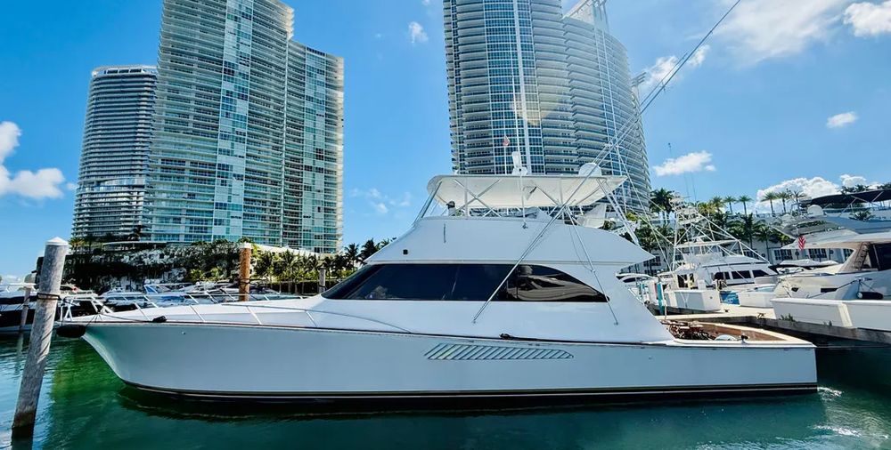 NEW TO THE MARKET!! - 2004 65' VIKING CONVERTIBLE KICKBACK